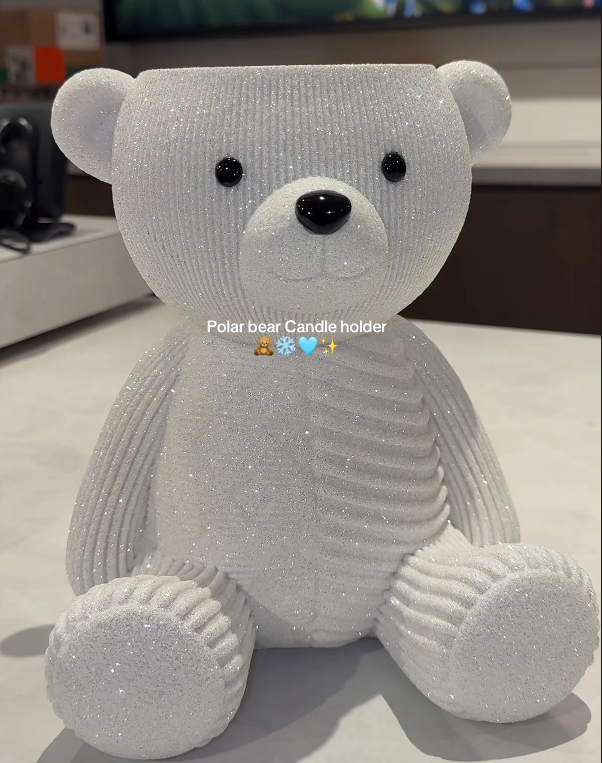 Close-up casual snapshot of the white textured bear holder without a candle jar