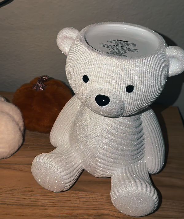 Bear candle holder with its top opening visible and no candle jar