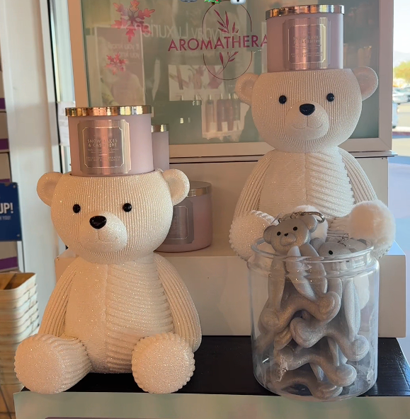 Small and larger teddy bear candle holder displays with jar candles