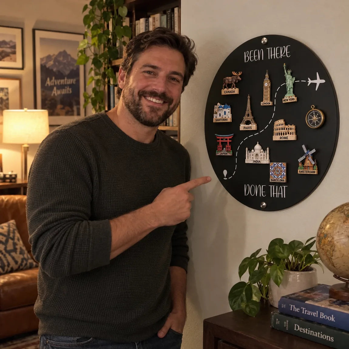 Man standing beside his travel magnet board at home