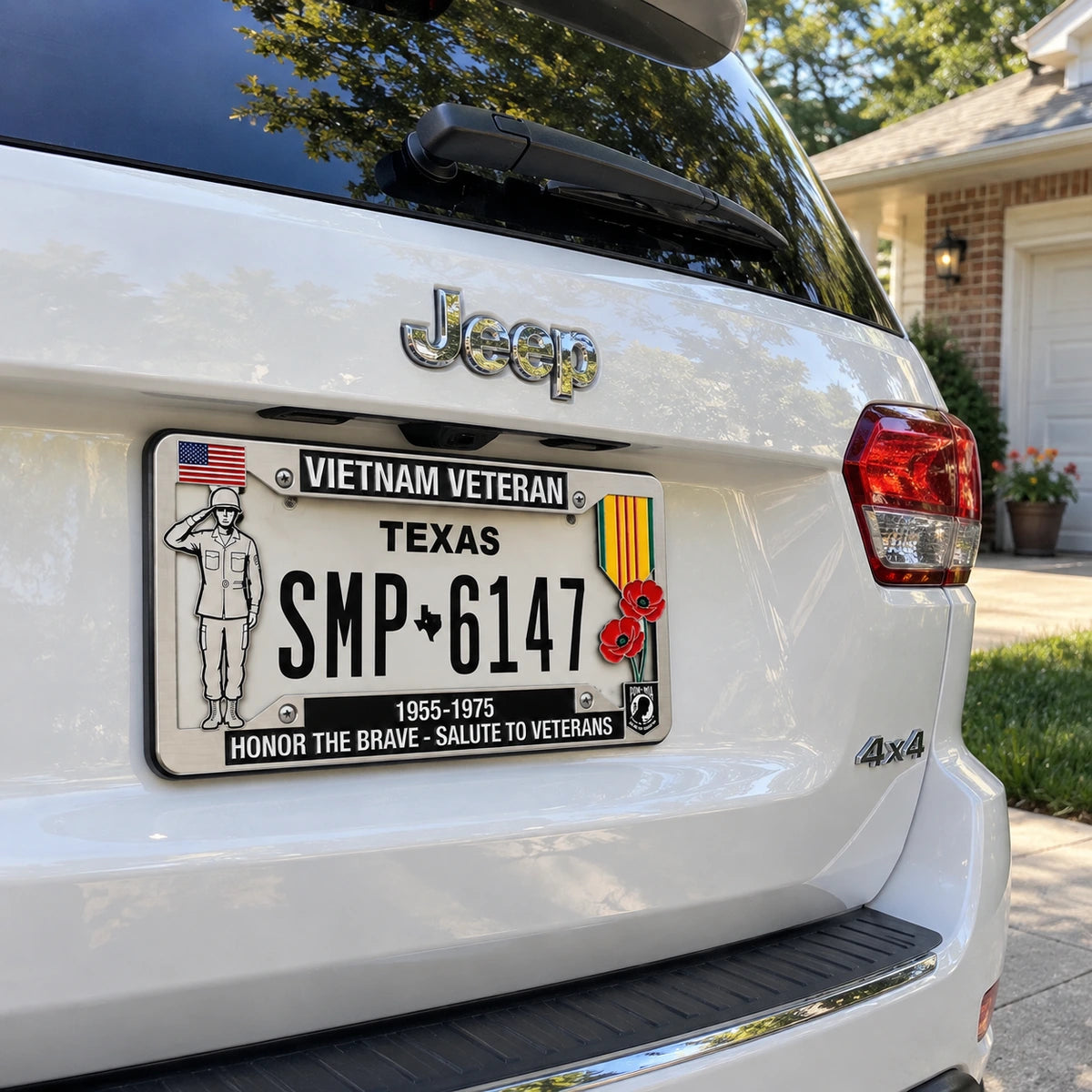 Vietnam Veteran tribute plate frame on a white SUV