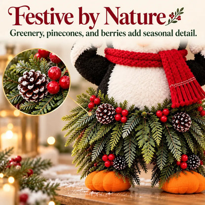 Weihnachtliche Pinguin-Willkommensdekoration mit Weihnachtsmütze und festlichem Grün