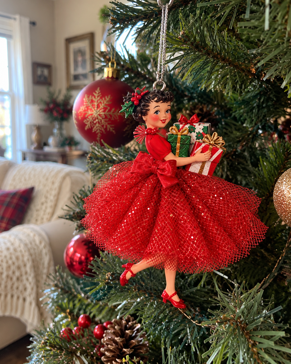 Close-up of the ruby red Christmas girl with wrapped presents and full glittery skirt
