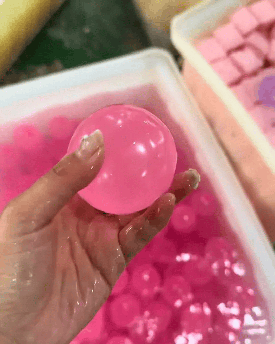 Squishy toy being squeezed — demonstration 2