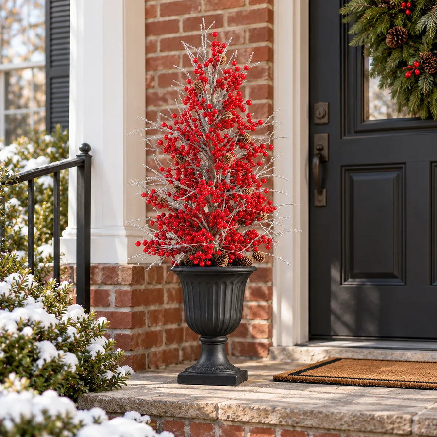 Frosted red berry urn filler displayed unlit in daylight