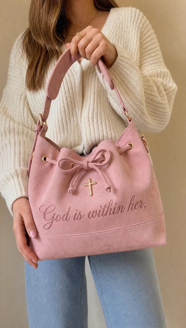 Woman holding the bag with a casual outfit
