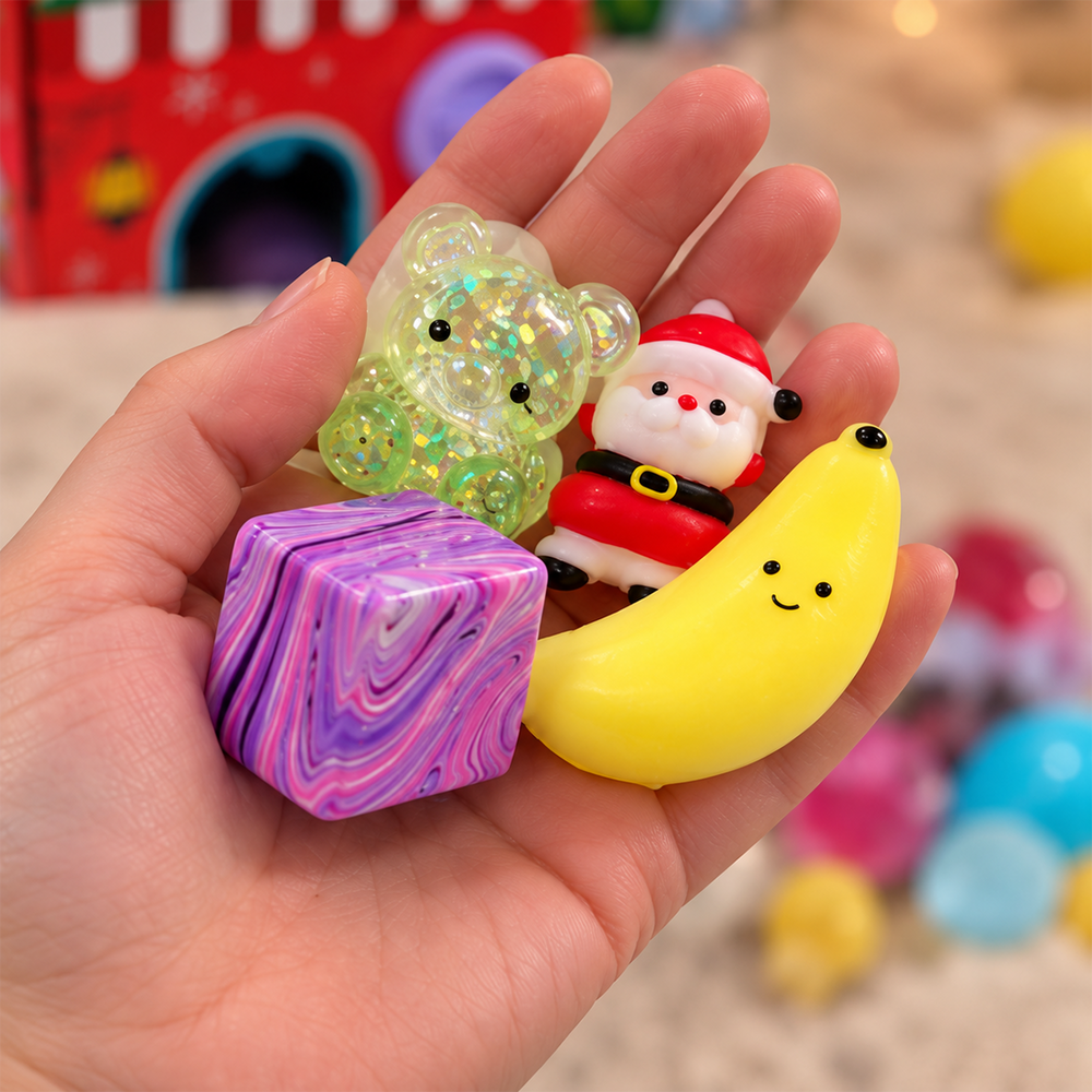 Adult hand holding miniature squishy toys to show their approximate size