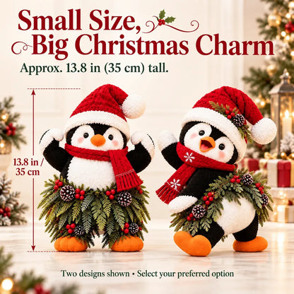 Weihnachtliche Pinguin-Willkommensdekoration mit Weihnachtsmütze und festlichem Grün