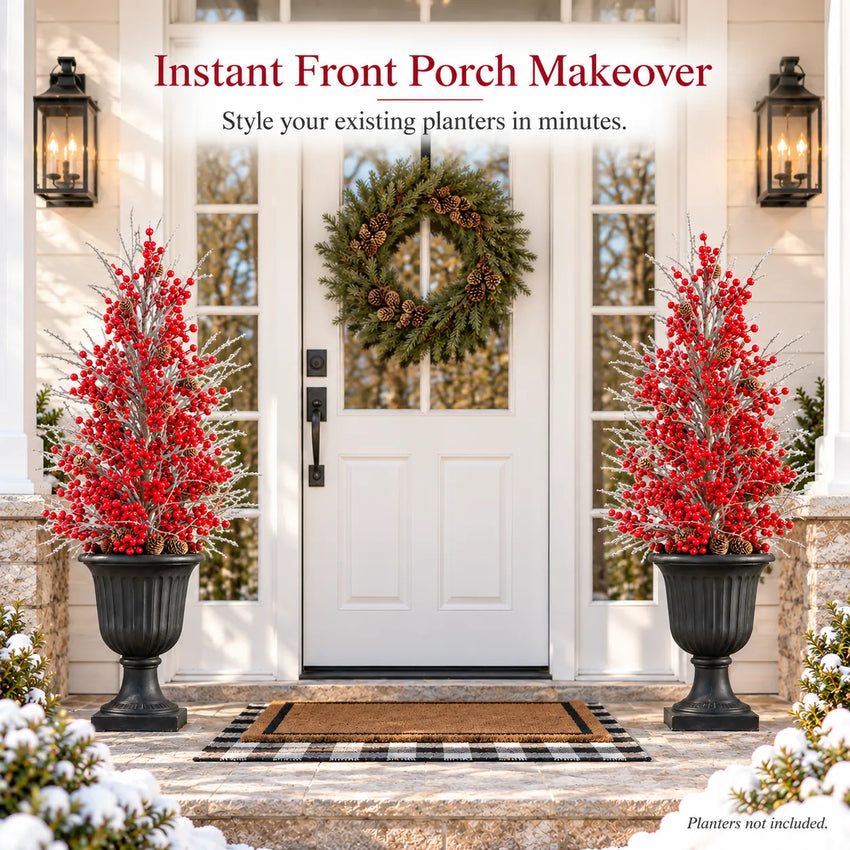 Matching Christmas arrangements decorating a front porch