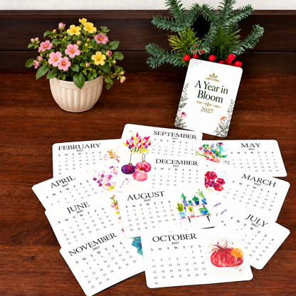 The calendar cards arranged to show the different monthly botanical designs