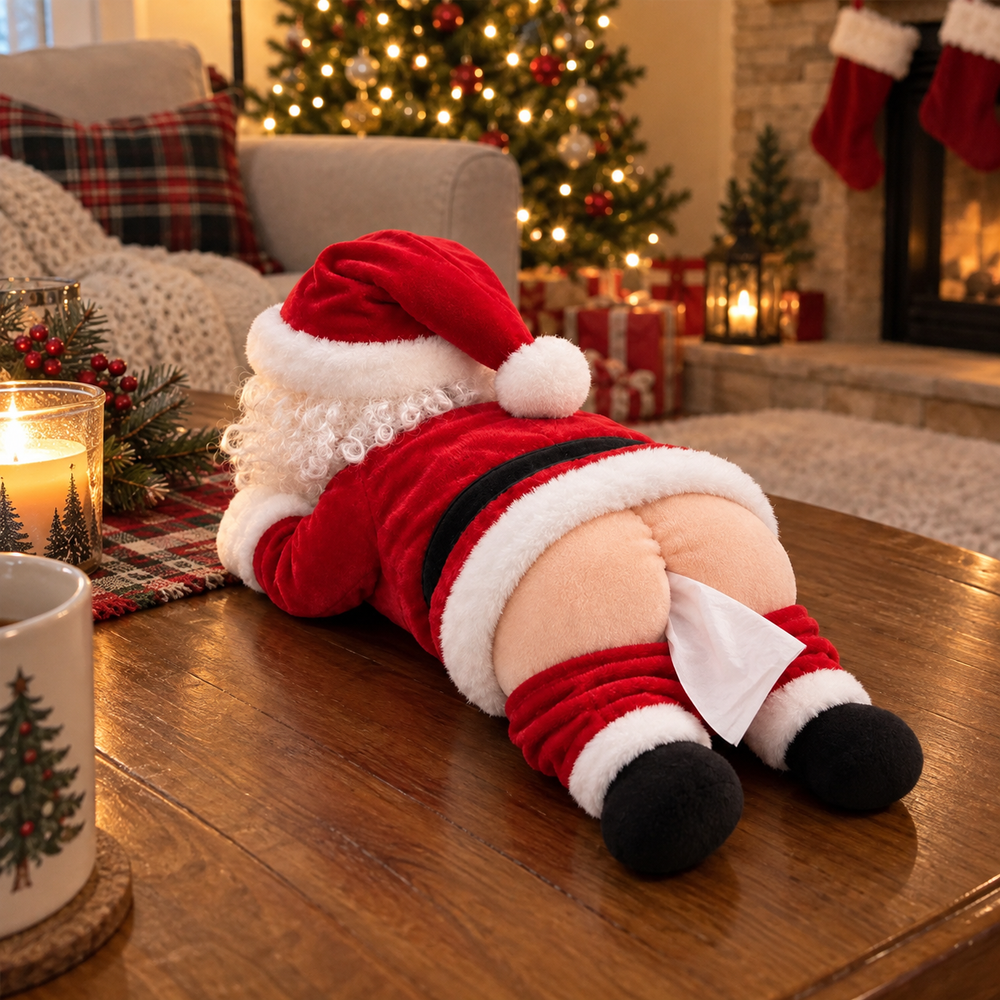 Hands holding the Santa tissue holder while pulling a tissue from its back