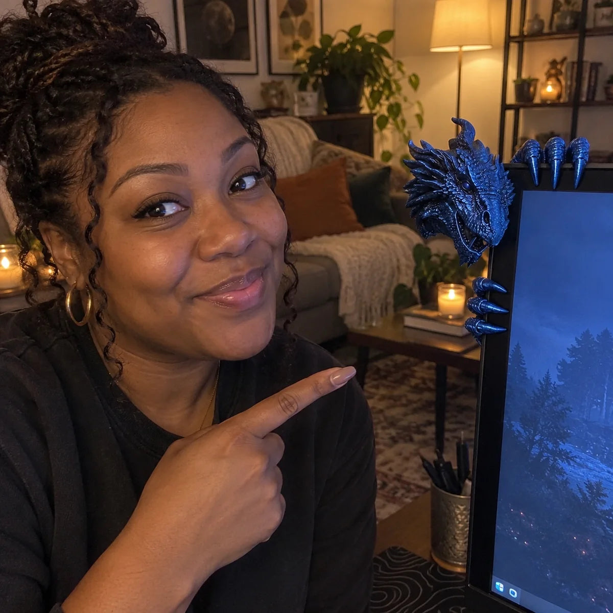 Blue dragon monitor buddy next to a woman in a cozy room