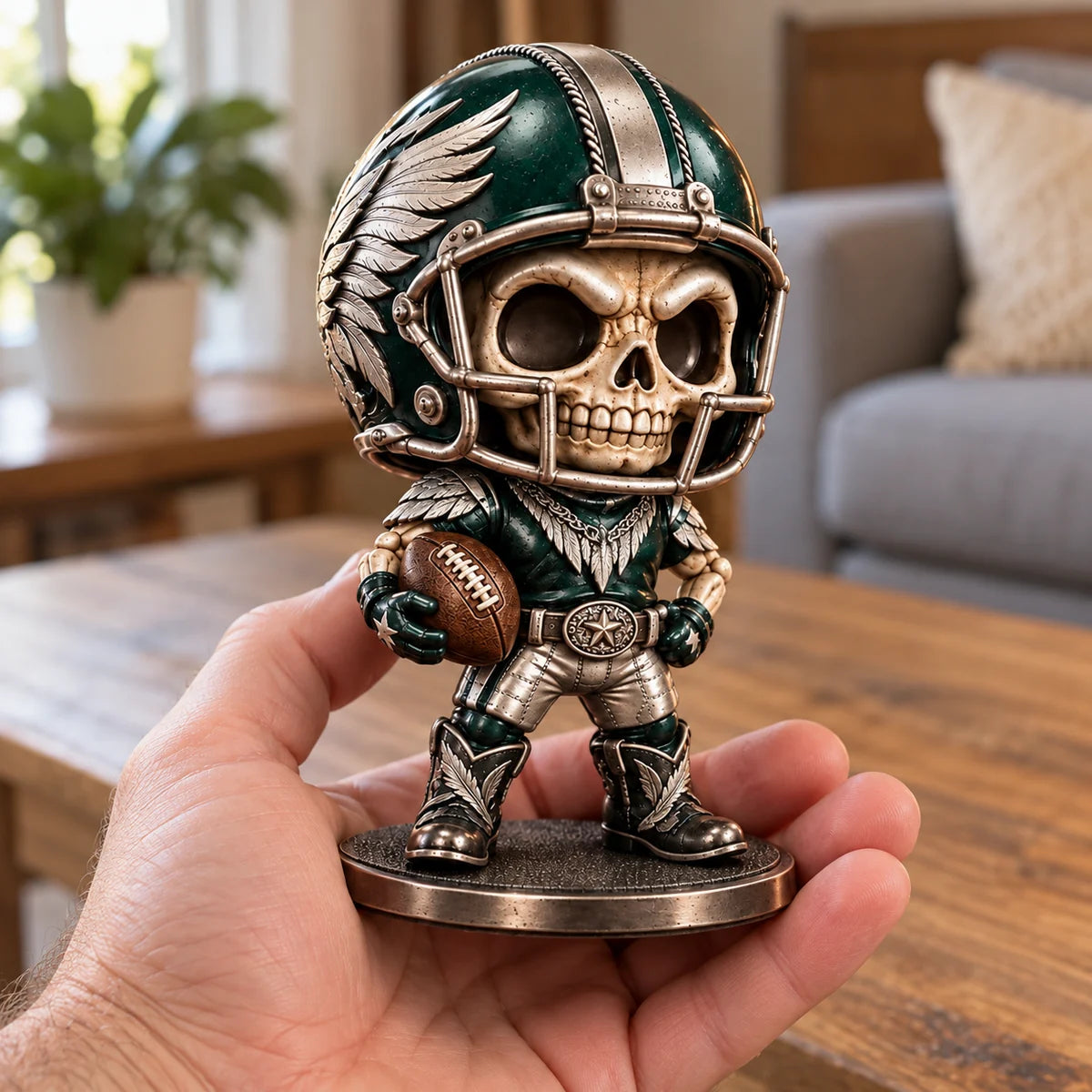 Football skull figurine held in a hand