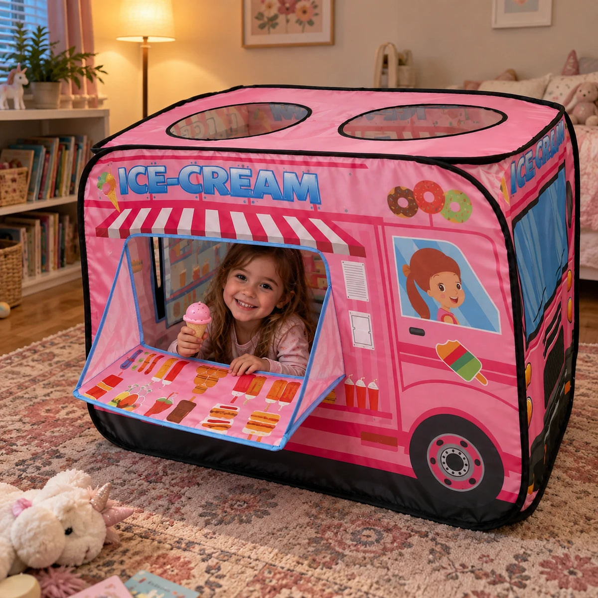Little girl pretending with pink ice cream truck tent